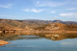 Image du Maroc Professionnelle de  Le barrage Laghrasse "dit barrage Hassan II", il se situe à 50 km au sud est de Taourirte au nord du Maroc, Samedi 10 Février 2006, ce barrage fournit en eau potable  le barrage Mohammed V qui sert de lien pour Machraa Hammadi,  ce dernier permet l'approvisionnement des centre de Taourirte et El Aïoun Sidi Mellouk. (Photo / Abdeljalil Bounhar) 